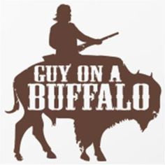 Guy on a buffalo